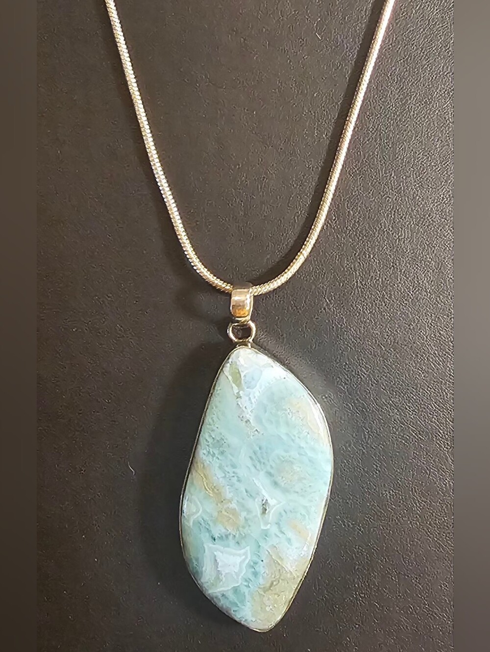 Beautiful extra large larimar pendant with sterling silver chain. Like New.